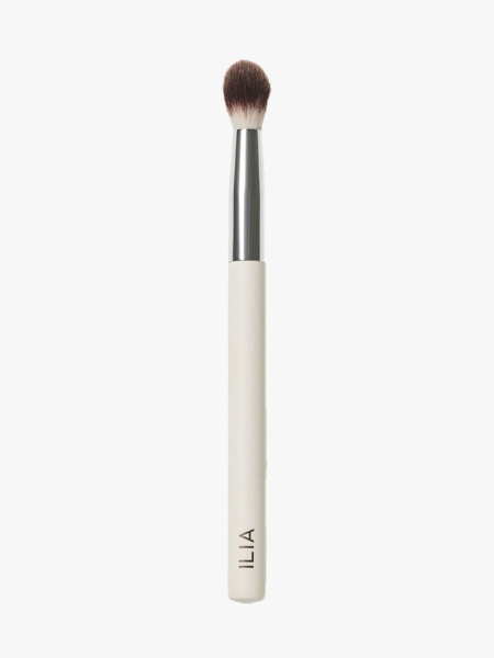 ILIA Beauty Blending Brush tool with white handle on light gray background