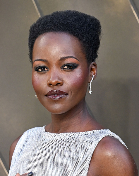 fall makeup trends 2026 berry tinted lips on Lupita Nyong'o