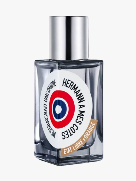 Spray bottle of Etat Libre D’Orange Hermann a Cotes with silver cap on light gray background