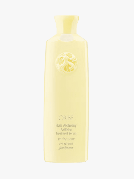 Oribe Hair Alchemy Fortifying Treatment Serum in branded component on a light gray background